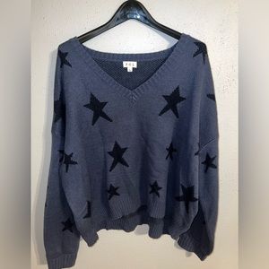 Oversized, off the shoulder , star printed sweater